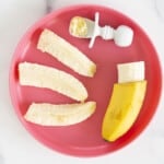 Banana in different forms on red plate for blw banana
