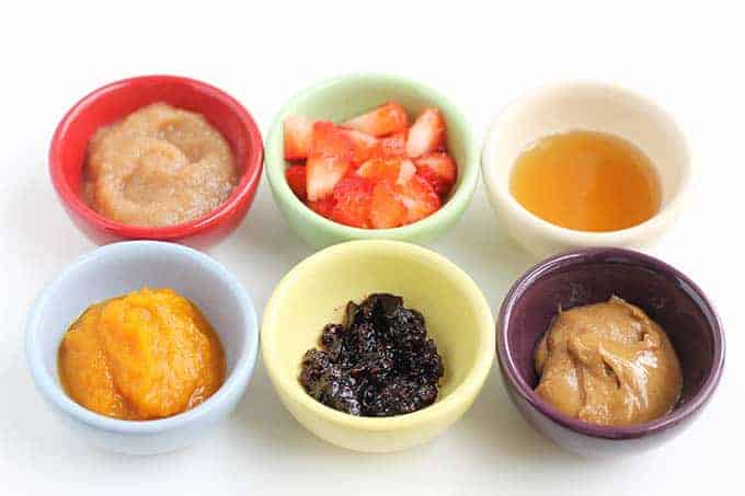 flavorings for baby yogurt including applesauce, berries, and nut butter