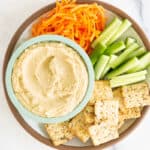 hummus without tahini on plate with dippers.