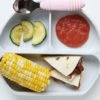 cut up vegetarian quesadillas for kids on plate
