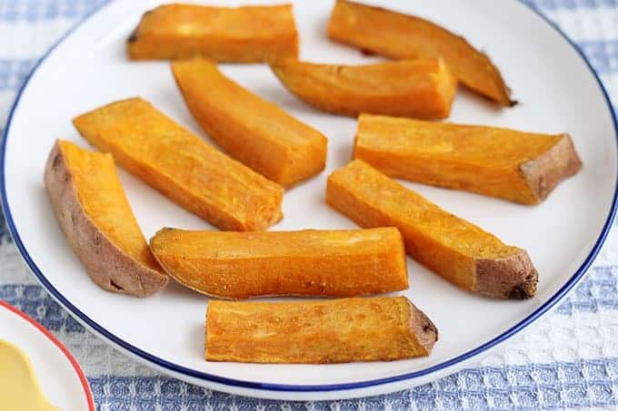 roasted sweet potato wedges on white plate