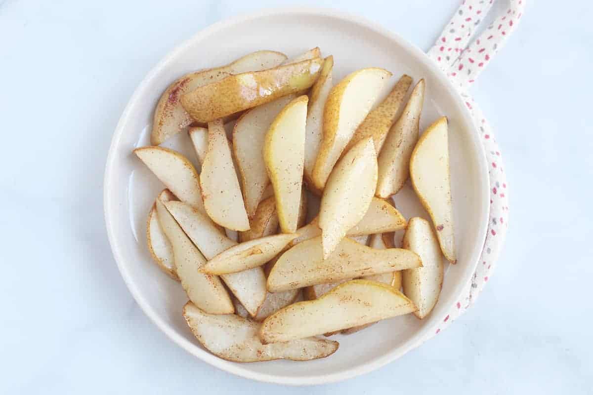 baked pear slices on white plate